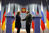 Merkel + Steinbrück = Putin?